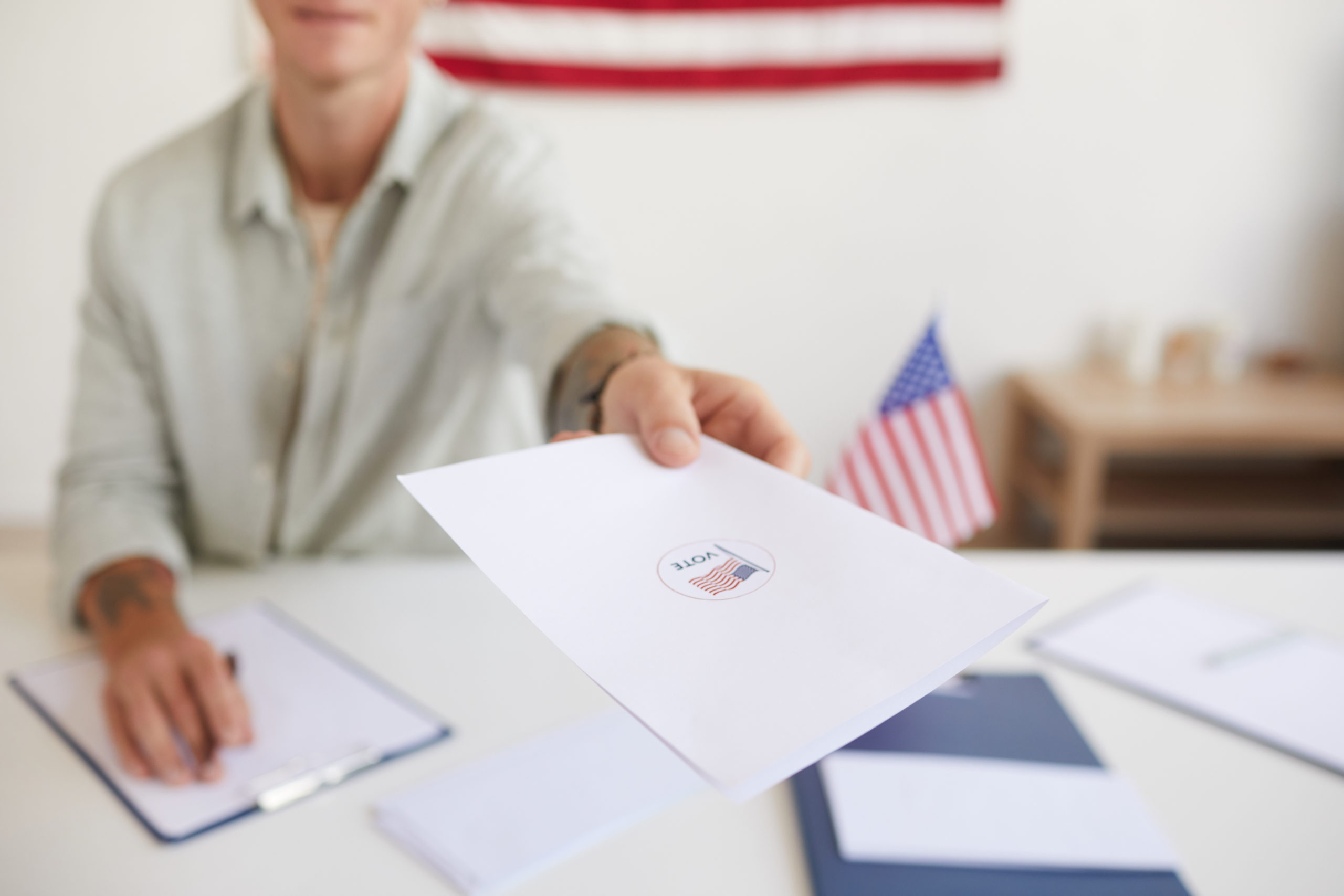 Man Holding Voting Papers Closeup Man Holding Voting Papers Closeup K3GLK4D Scaled